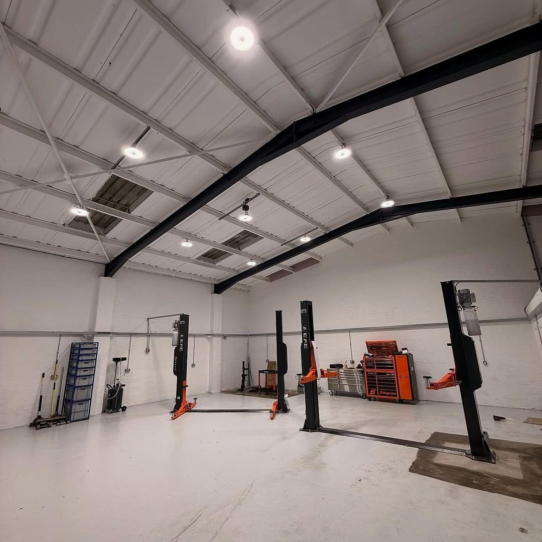 Nine low-bay LED lights fitted over a Bridgend garage workshop